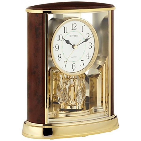 Rhythm (Japan) Plastic Contemporary Motion Table Clock, Rotation Pendulum, Plastic Case Analogue Dimension- 19x24x10cms Rhythm (Japan) Plastic Contemporary Motion Table Clock, Rotation Pendulum, Plastic Case Analogue Dimension- 19x24x10cms